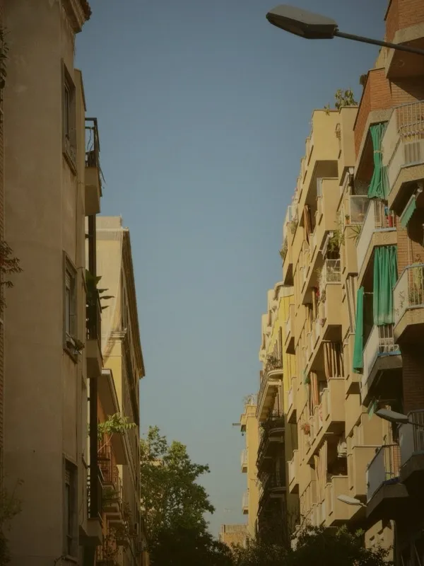 Barcelona apartment buildings against blue sky